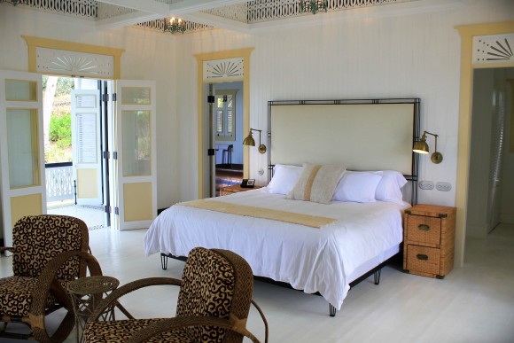 Bedroom One main room opens into a separate shuttered porch; blurring the line between outside and in. Spacious bathrooms and closets adjoin the main room.