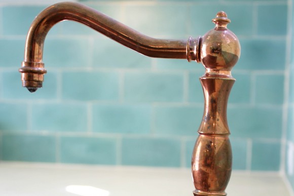 Faucet We have enormous custom copper tubs for soaking and showers clad in unique Dominican hand made tile with large copper rain shower.